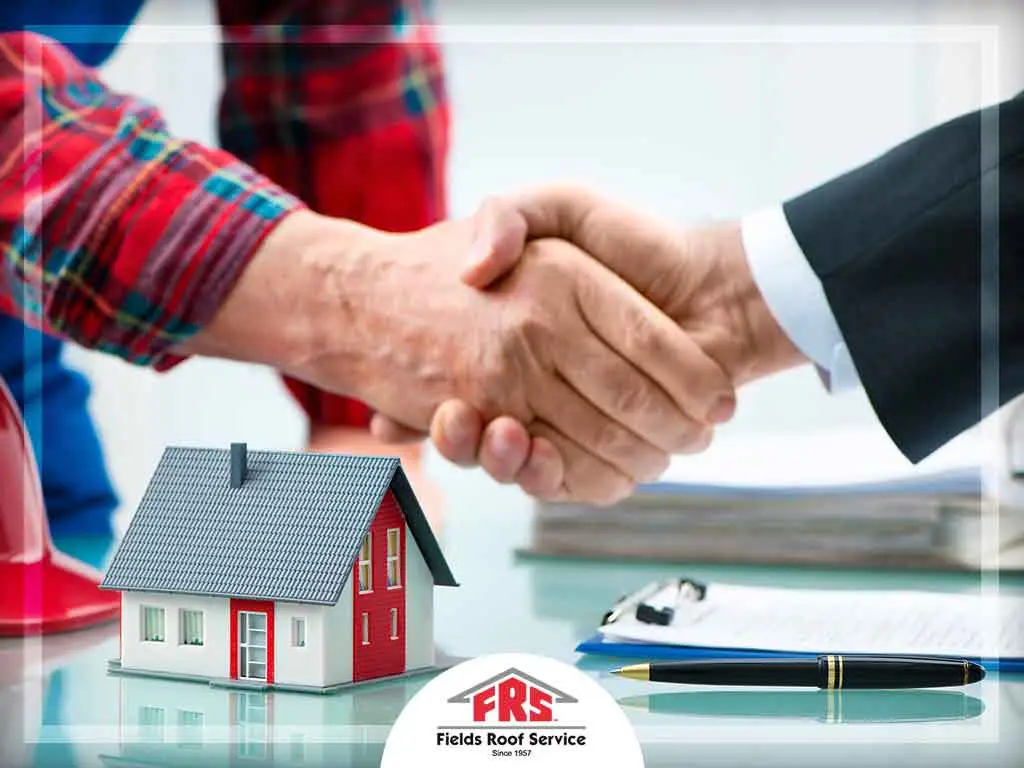 Handshake over home construction agreement