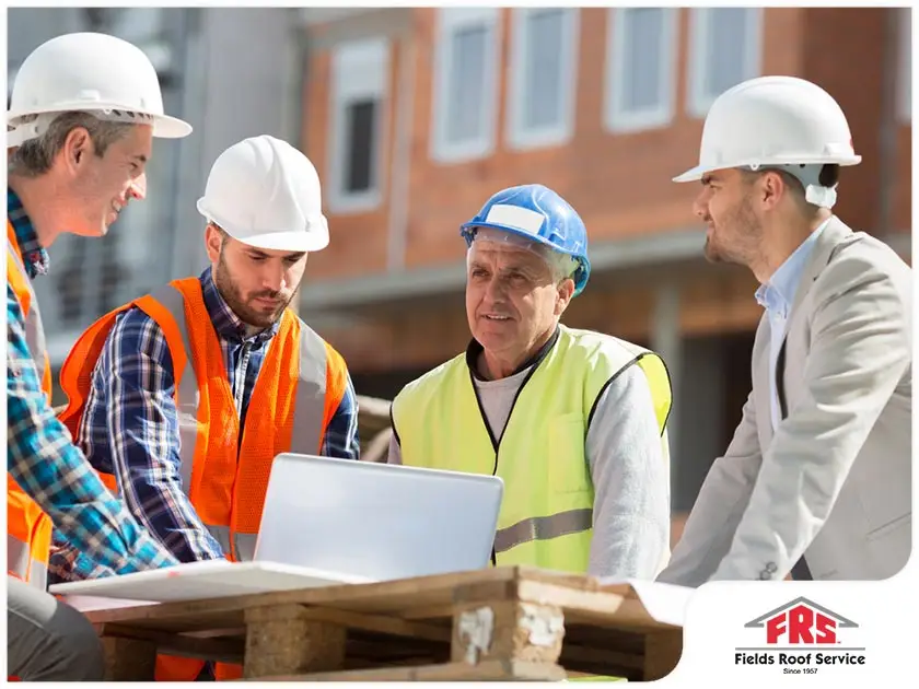 Construction workers discussing project plans.