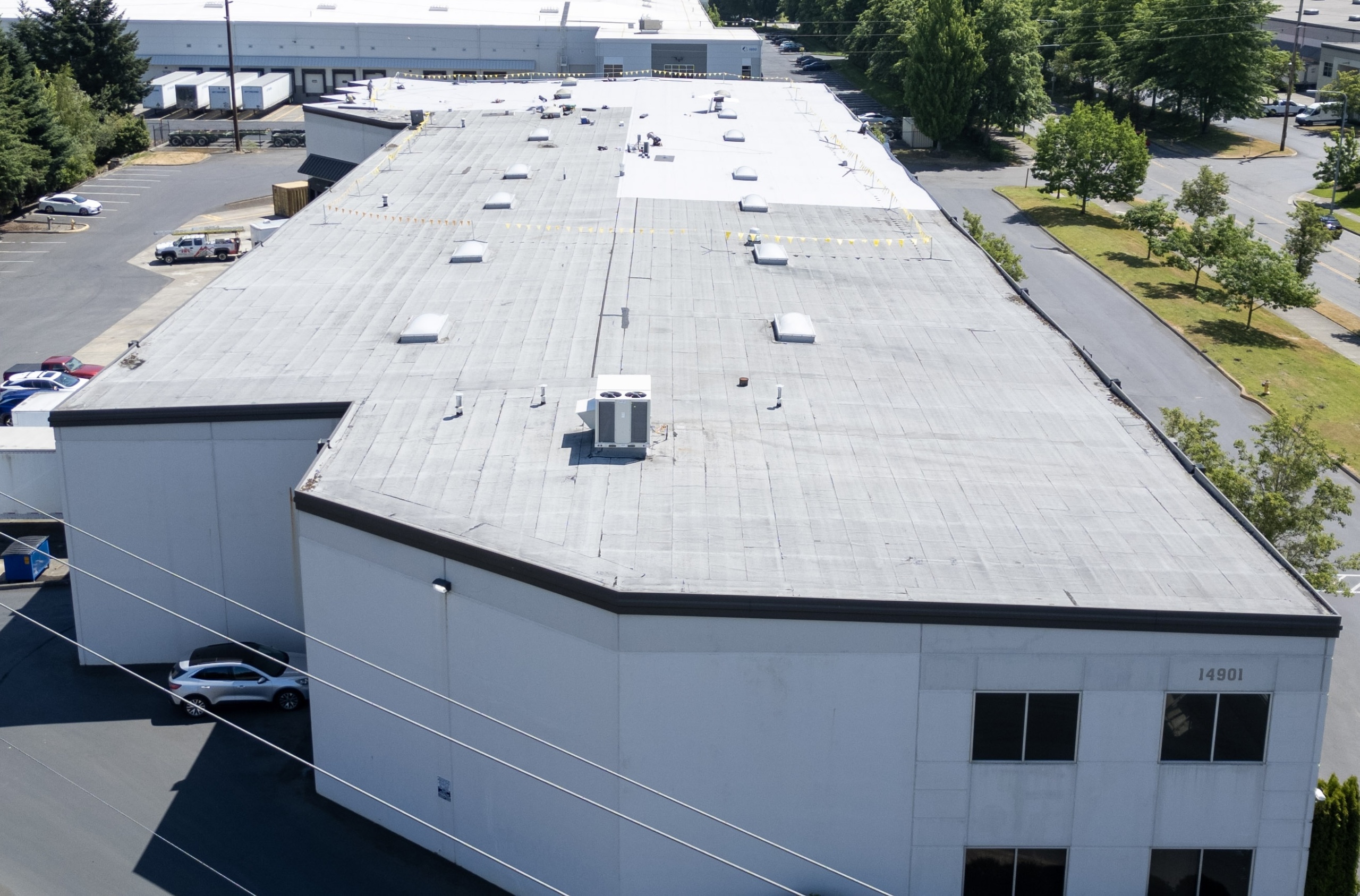 Why Olympia Businesses Need Flat Roof Repairs This Fall Storm Season flat roof repair