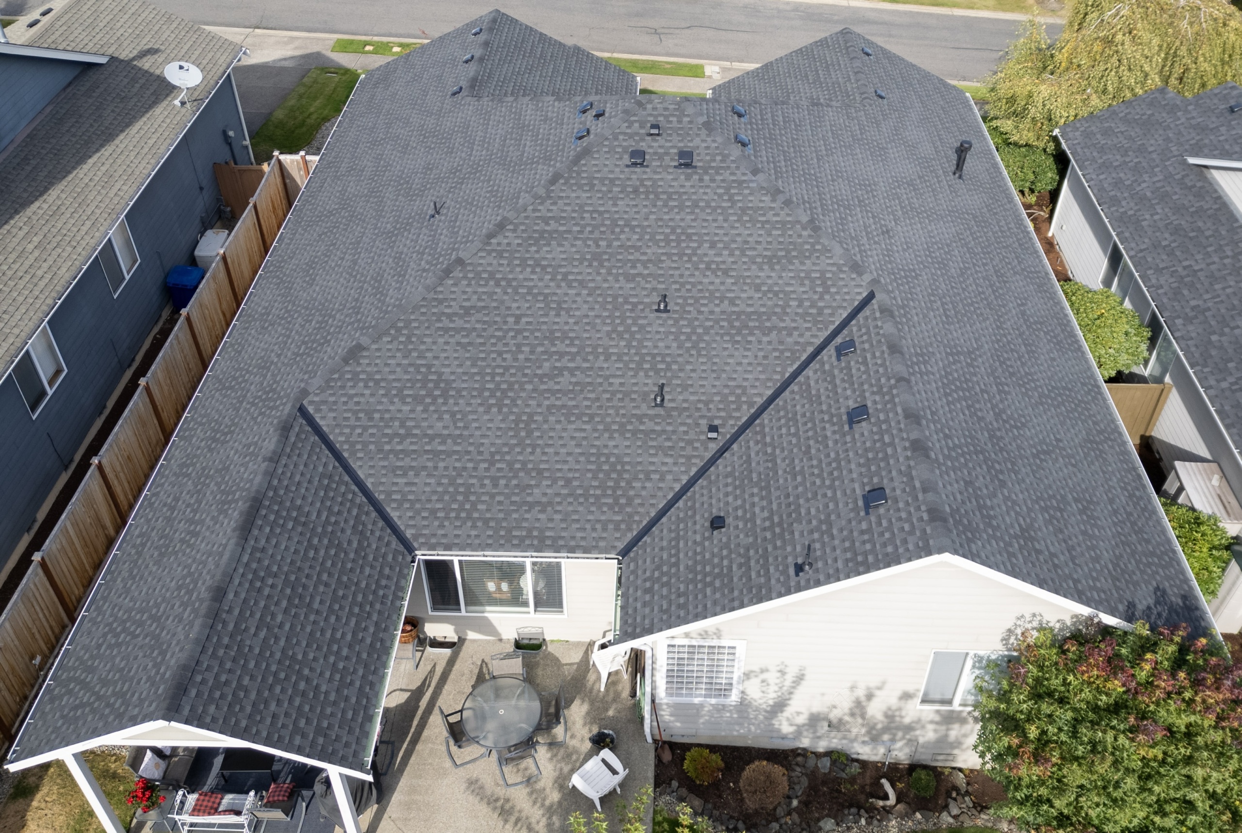 Aerial view of a gray shingled roof.